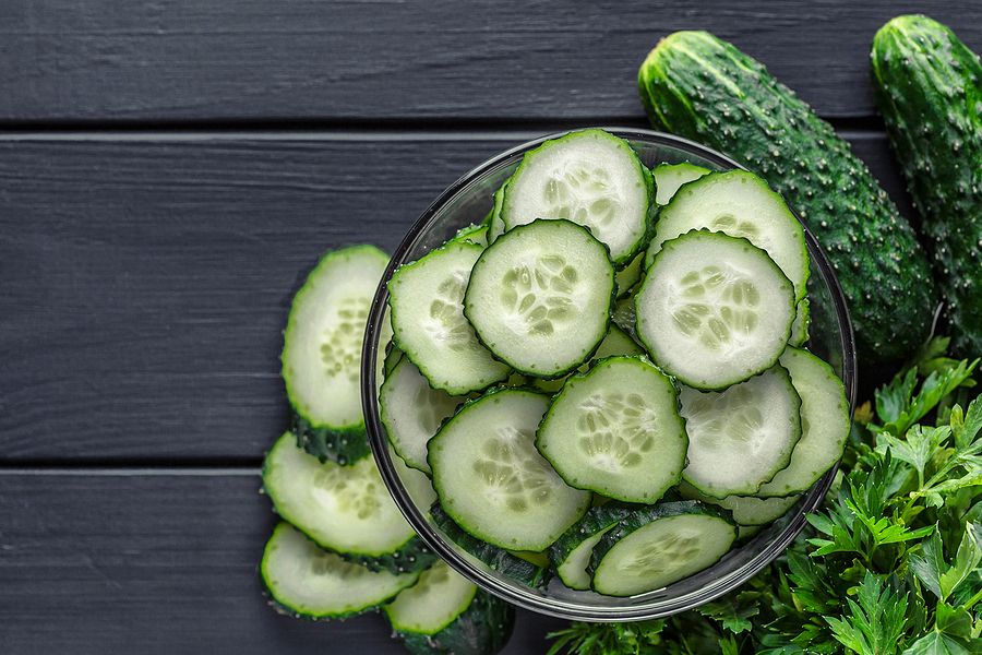 Cucumber On Dark Wood Texture Background.cucumbers Harvest In Summer. Cucumbers For Salads Or Canni