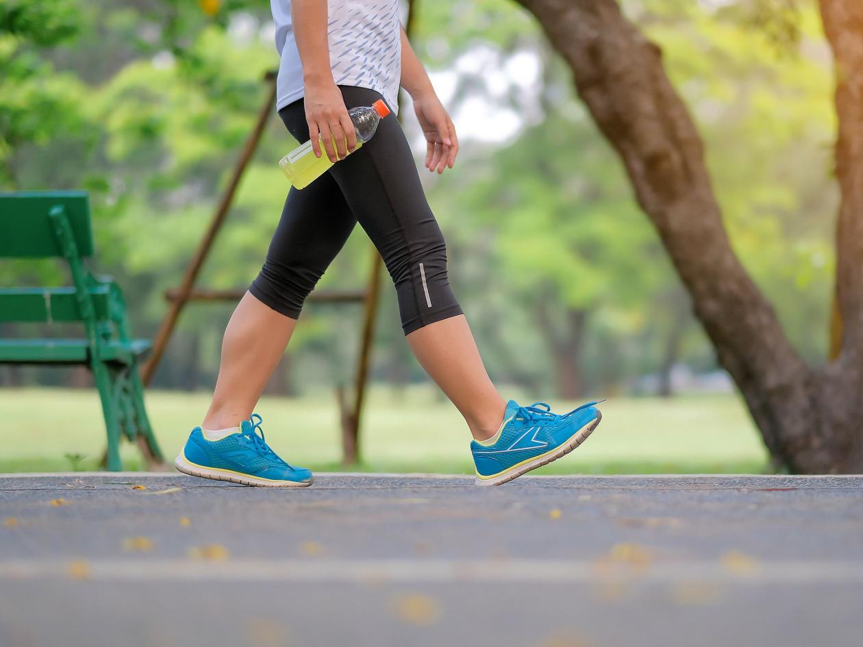 Young Fitness Woman Legs Walking In The Park Outdoor, Female Runner Running On The Road Outside, Asi