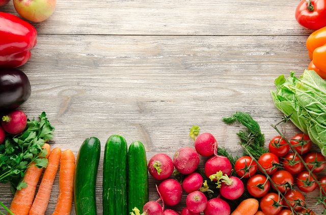 bigstock Fresh Vegetables On A Wooden B 212638408