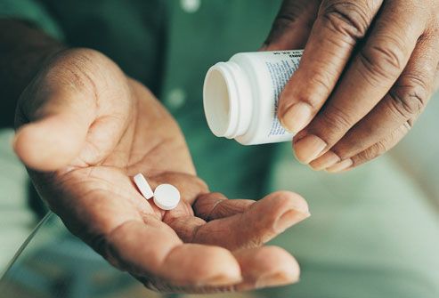 getty rf photo of man taking medication