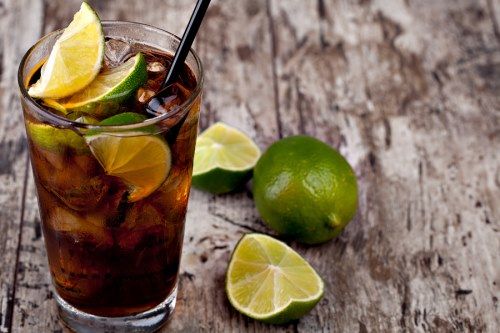 bigstock-Cuba-Libre-Drink-with-lime-on--38836402