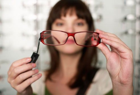 18getty rm photo of woman holding glasses