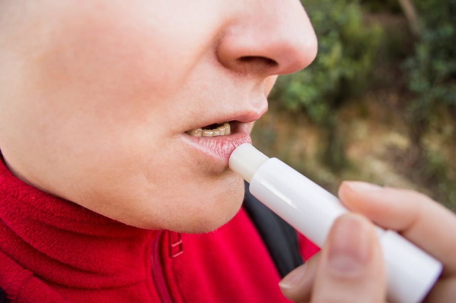 bigstock Taking Care Of Her Lips 106163096