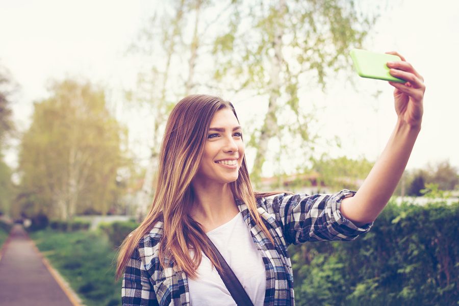 bigstock Teenage girl taking a selfie i 86408669