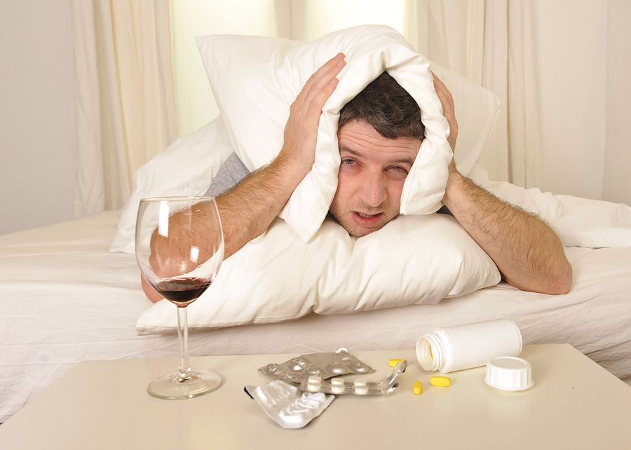 bigstock Man With Headache And Hangover 57346685