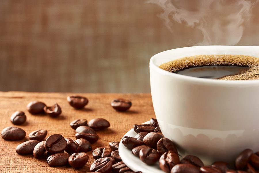 bigstock Coffee Cup And Coffee Beans 84244856