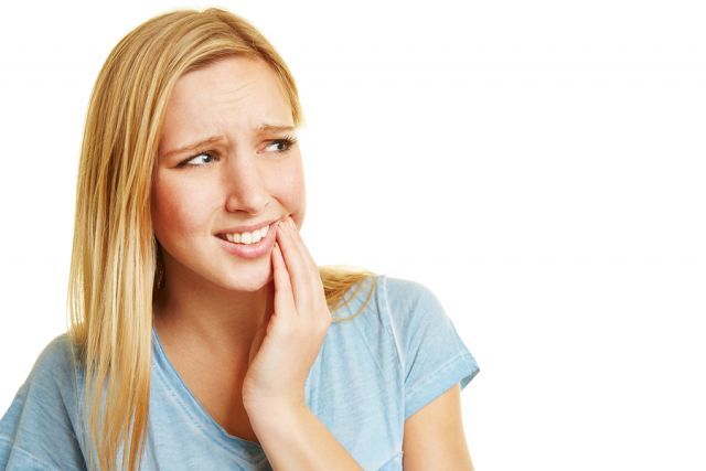 bigstock Young woman with toothache hol 88148951