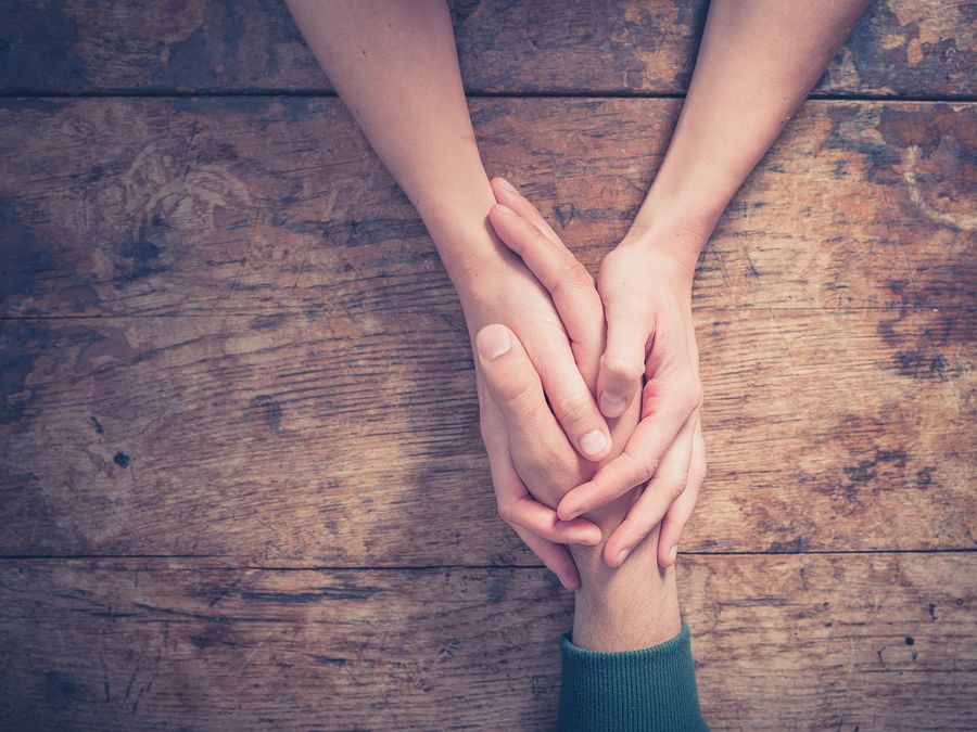 bigstock Man And Woman Holding Hands At 89199038