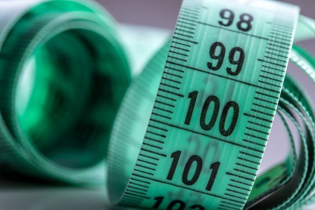bigstock Curved measuring tape Measuri 114133703