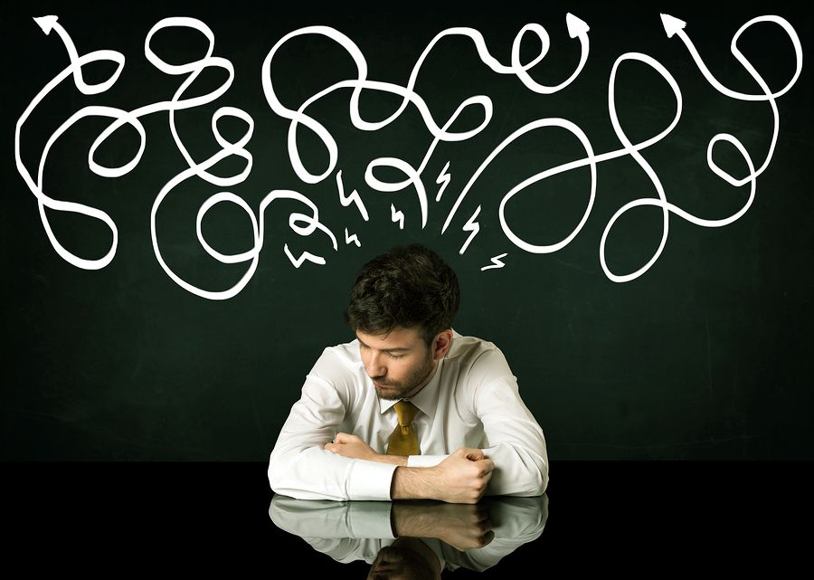 bigstock Depressed businessman sitting 122636072