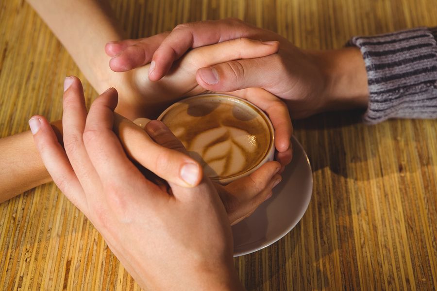 bigstock Couple holding hands around ca 100012808