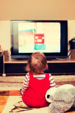 bigstock Child In Front Of Tv 69813214