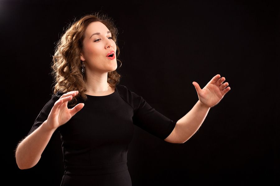 bigstock Female Choir Conductor 61839932 1