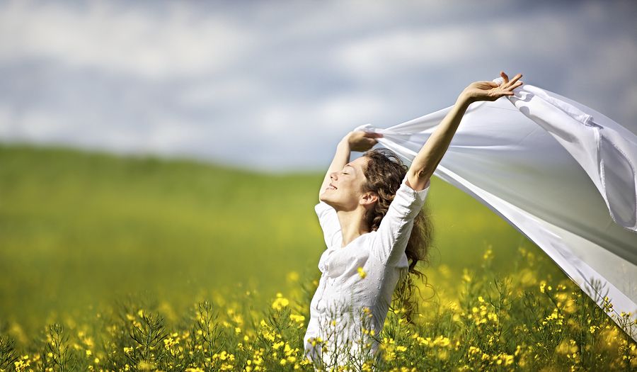 bigstock Young happy woman standing in 19498907