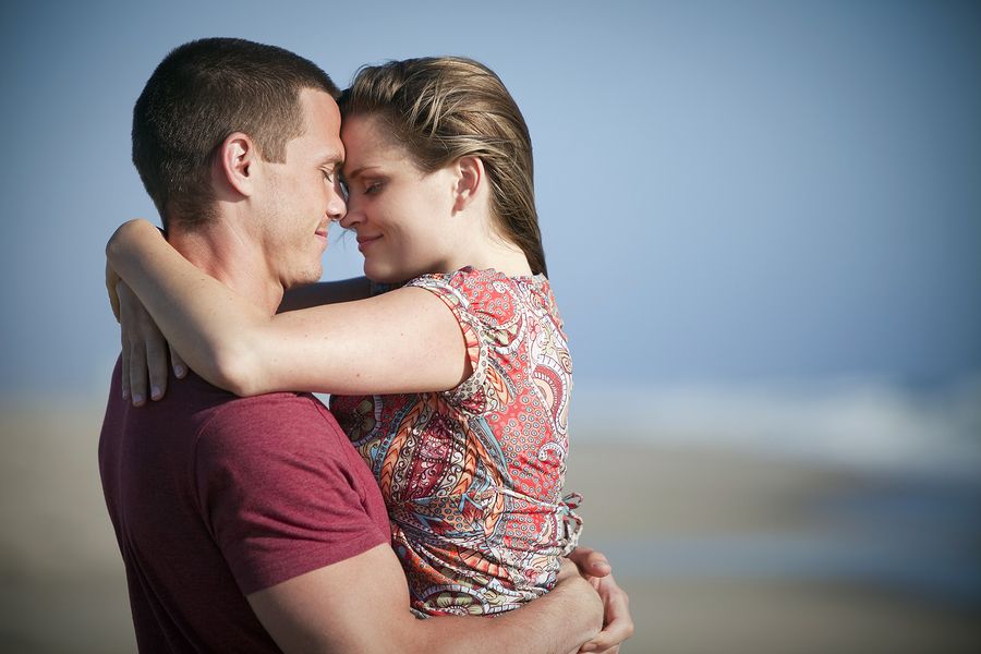 bigstock Loving couple at the beach 22446170