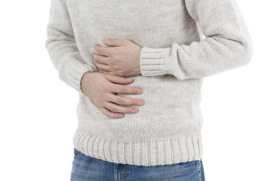 bigstock Man In Stomach Pain 81971738
