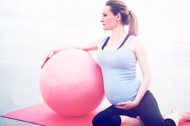 bigstock Pregnant Woman Doing Pilates E 96226499