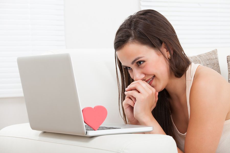 bigstock Beautiful Woman Dating Online 69574459