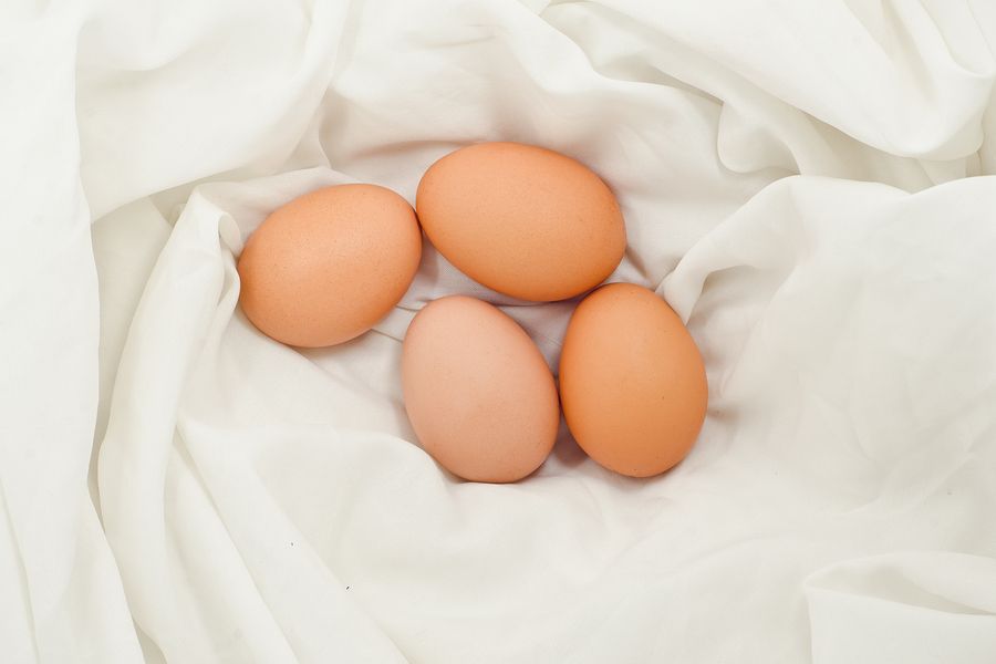 bigstock Eggs On Fabric White chicken E 144311480