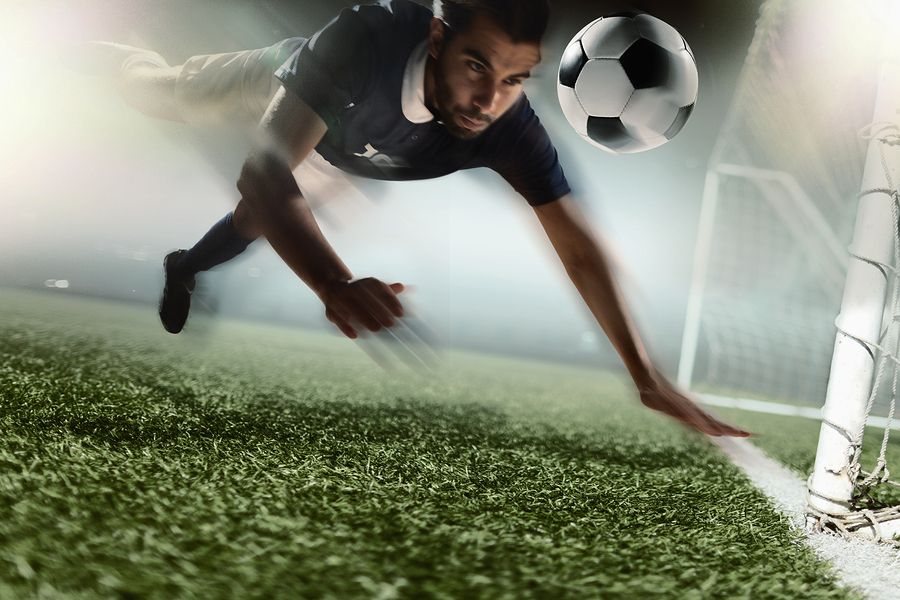 bigstock Soccer player heading soccer b 123807404