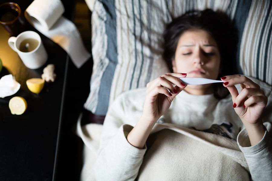 bigstock Sick young woman in bed at hom 118110938