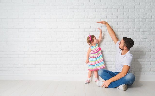 bigstock Concept Dad Measures Growth O 117794375