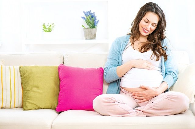 bigstock Pregnant Happy smiling Woman s 80495066