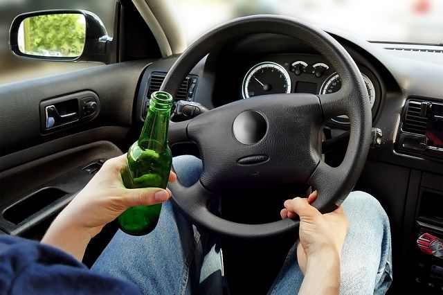 bigstock Unrecognizable Man Drinking An 143410784