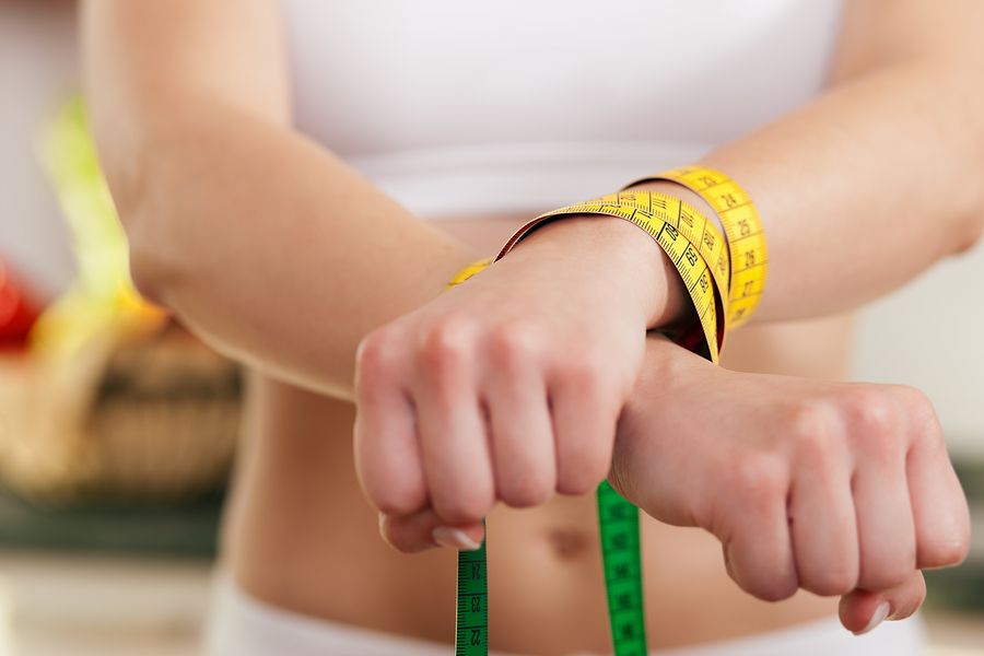 bigstock Dieting gone wild Woman hand 10165592