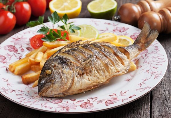 bigstock Fried bream fish with french f 127135352