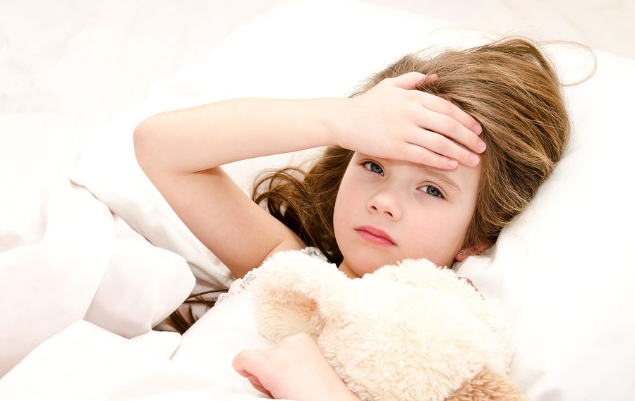 bigstock Sick Little Girl Lying In The 85355234