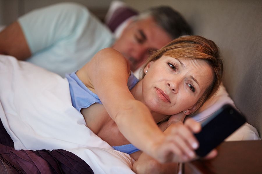 bigstock Couple In Bed With Wife Suffer 54834224
