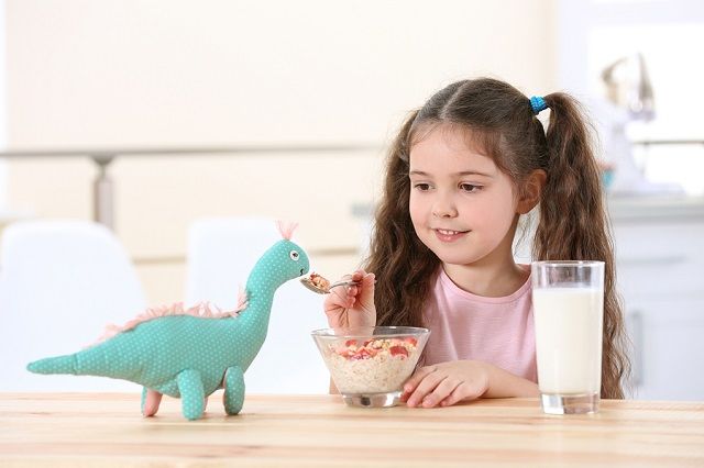 bigstock Cute little girl playing with 169581353
