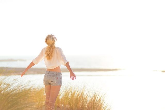 bigstock Free Happy Woman Enjoying Sun 105778535