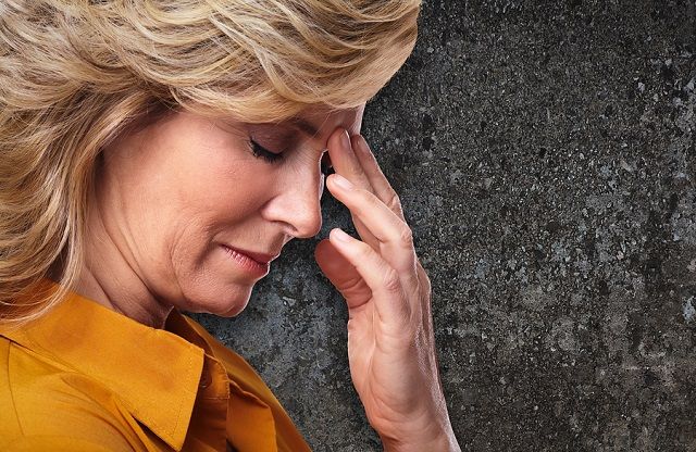 bigstock Woman having migraine headache 81133565
