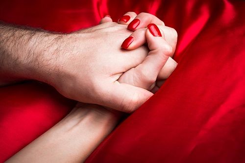 bigstock Young Couple Holding Hands Sen 113980715