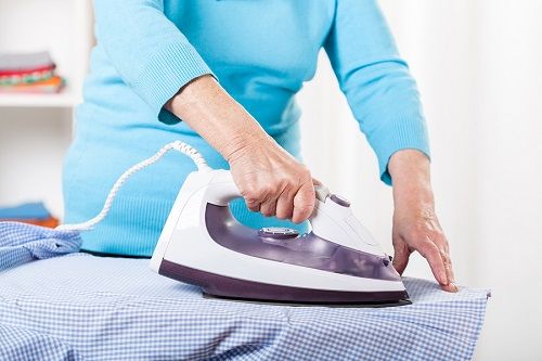 bigstock Elderly Lady During Ironing 60604397