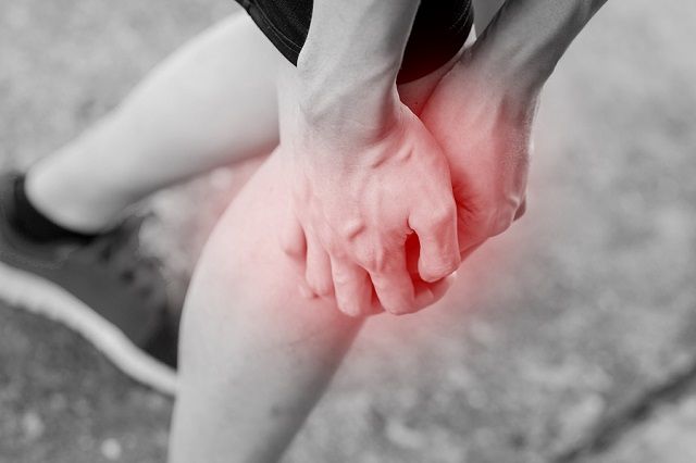 bigstock Runner Touching Painful Knee 115834556