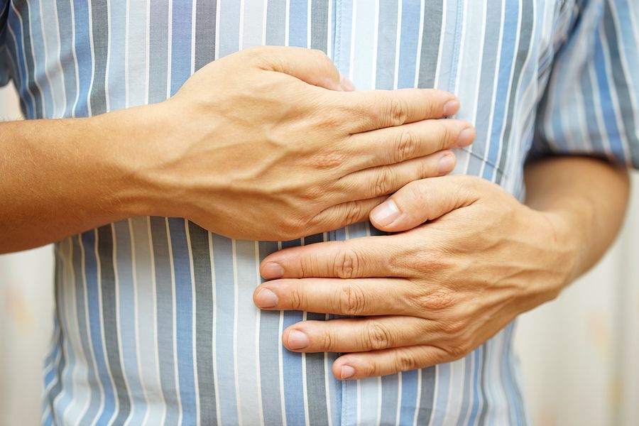 bigstock Stomach Ache Man Placing Hand 103570832