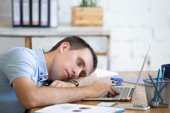 bigstock Young Man Sleeping On Office D 143681405