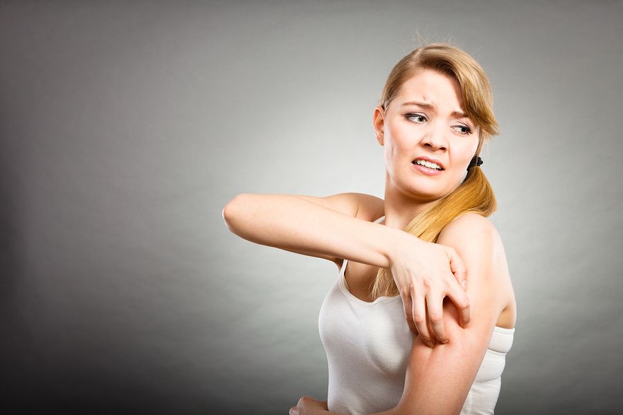 Scratching Her Itchy Arm