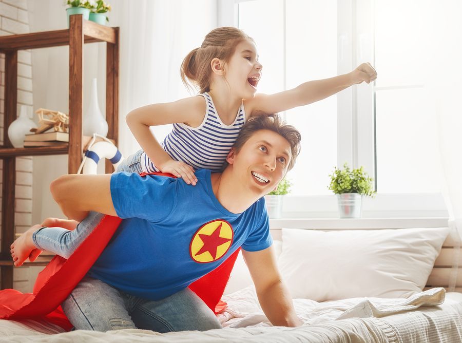 Father and his child playing
