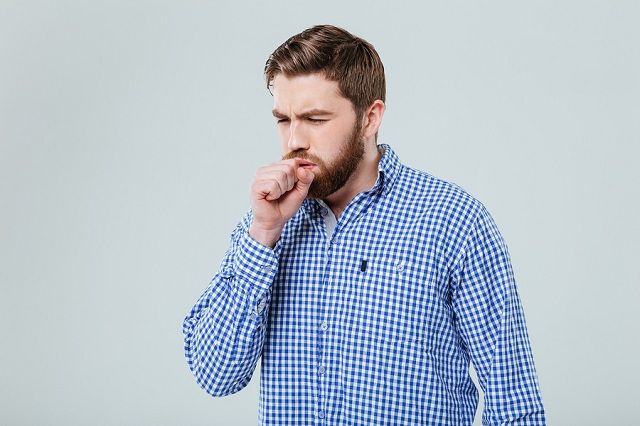 bigstock Sick bearded young man stading 169214198