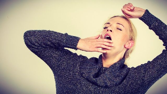 bigstock Sleepy Tired Yawning Woman S 177037078