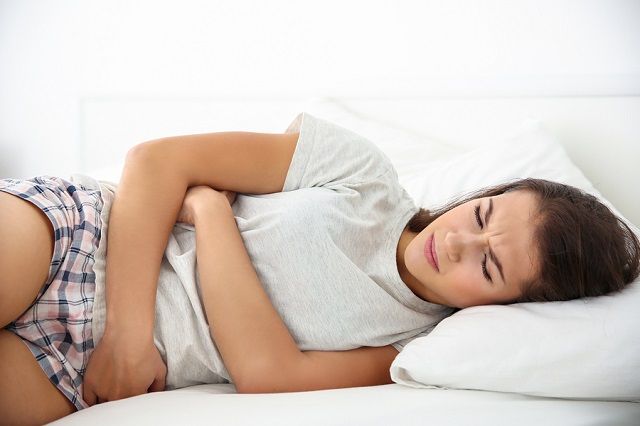 bigstock Young woman with stomach ache 168310289