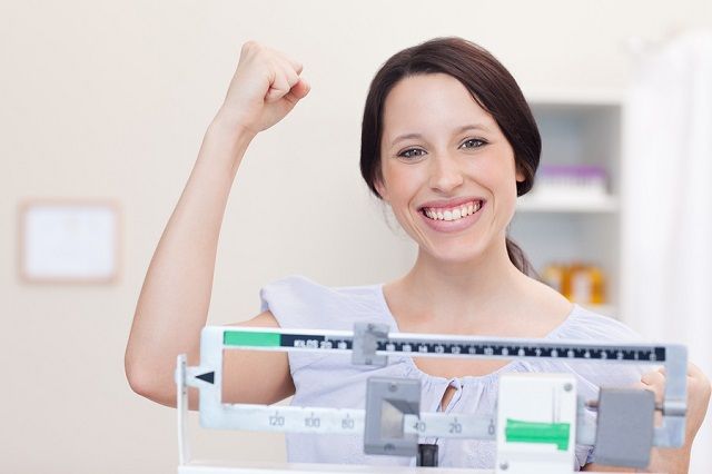 bigstock Smiling young woman happy abou 27299534