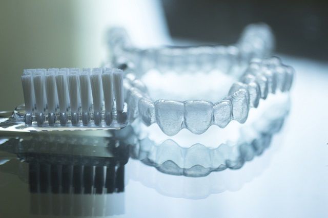 bigstock Invisible Dental Teeth Bracket 104795069