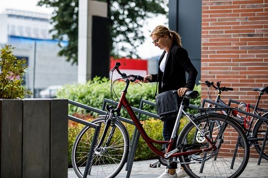 bigstock Urban biking woman riding bi 206250859