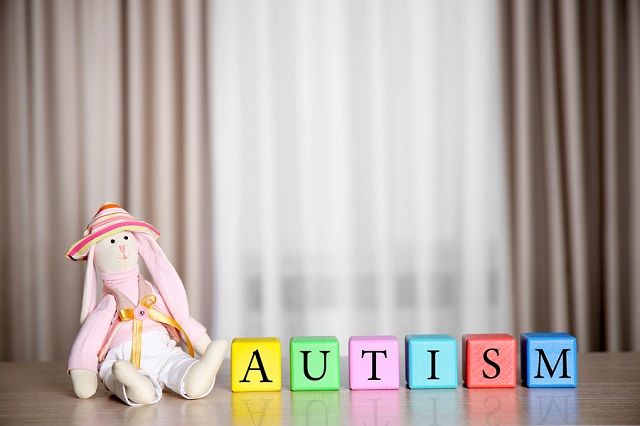 bigstock Wooden cubes with doll on curt 160495796