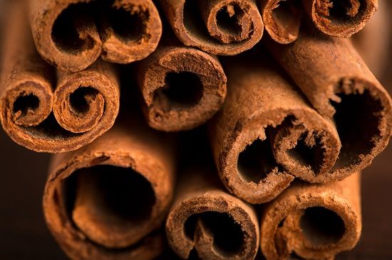 bigstock Cinnamon Sticks And Meal Close 185382880